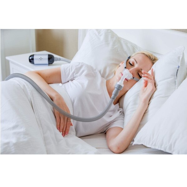 Woman Using Luna Travel CPAP